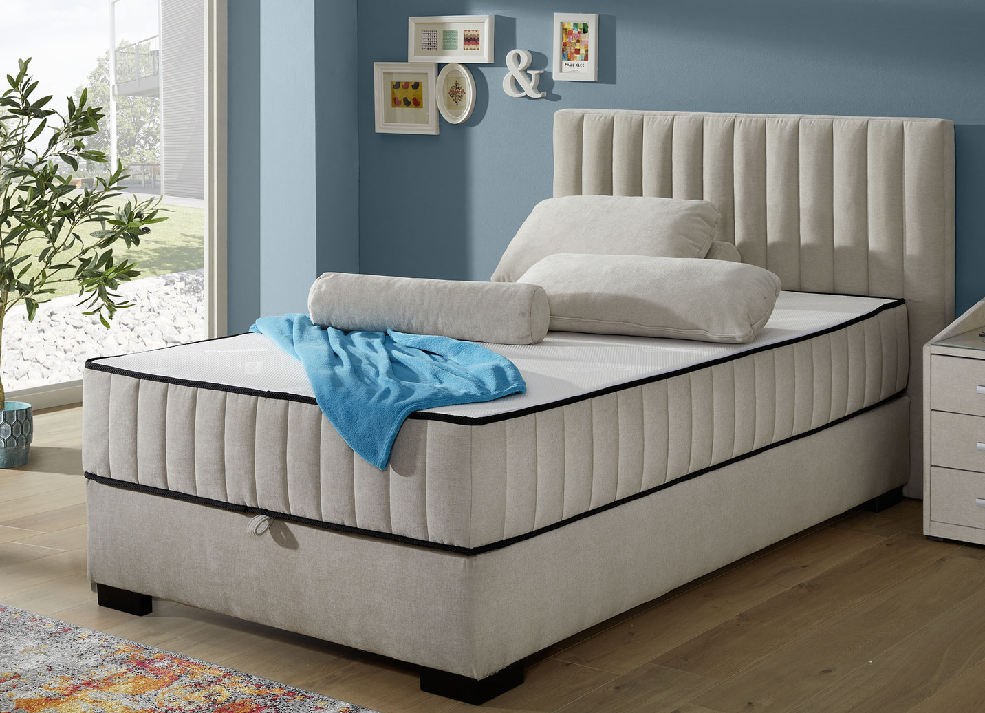 Boxspringbett mit Wendematratze und Bettkasten