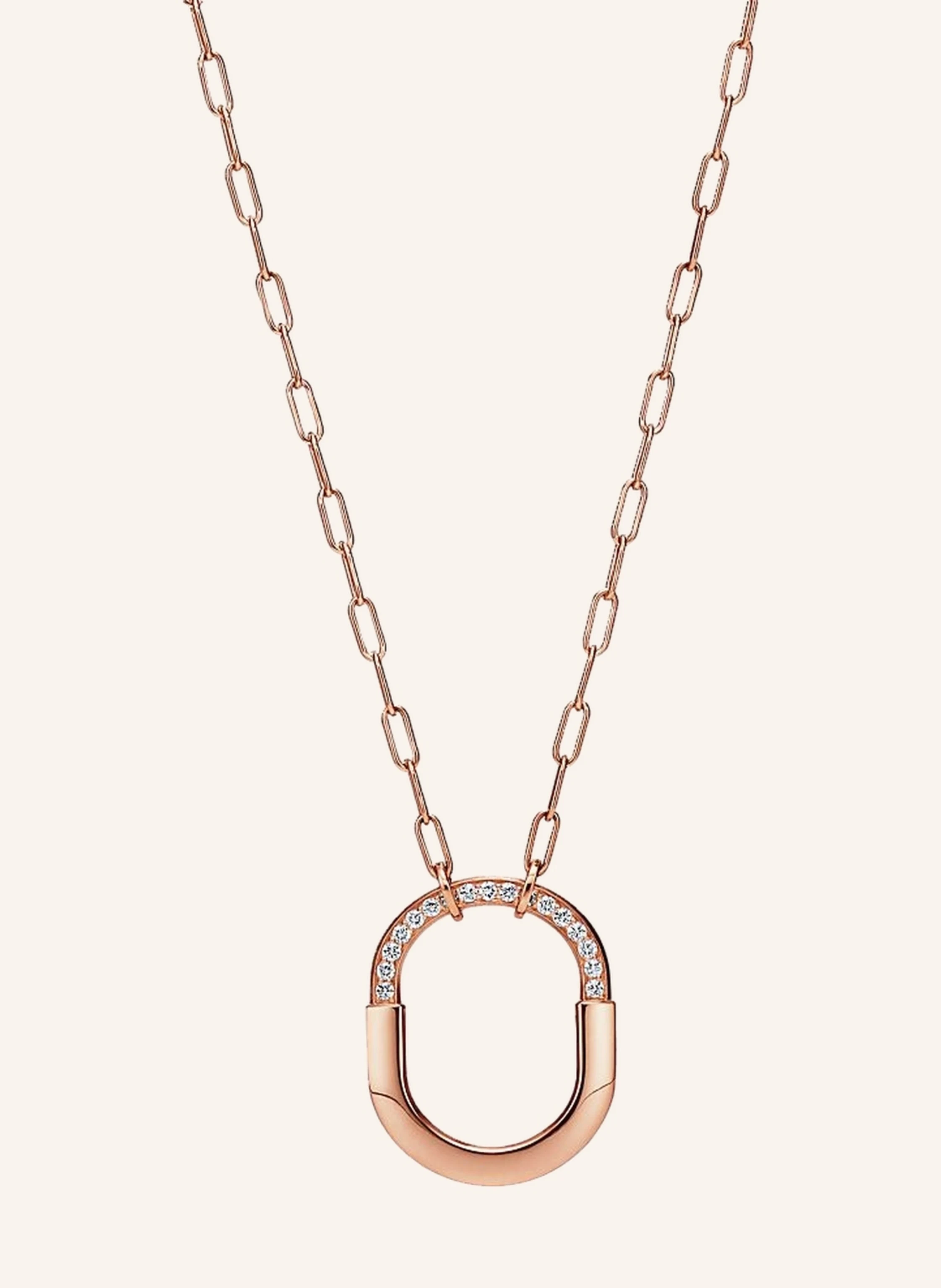 TIFFANY & Co. Tiffany Lock ANHÄNGER aus 18 Karat Roségold mit Diamanten im runden Brillantschliff.