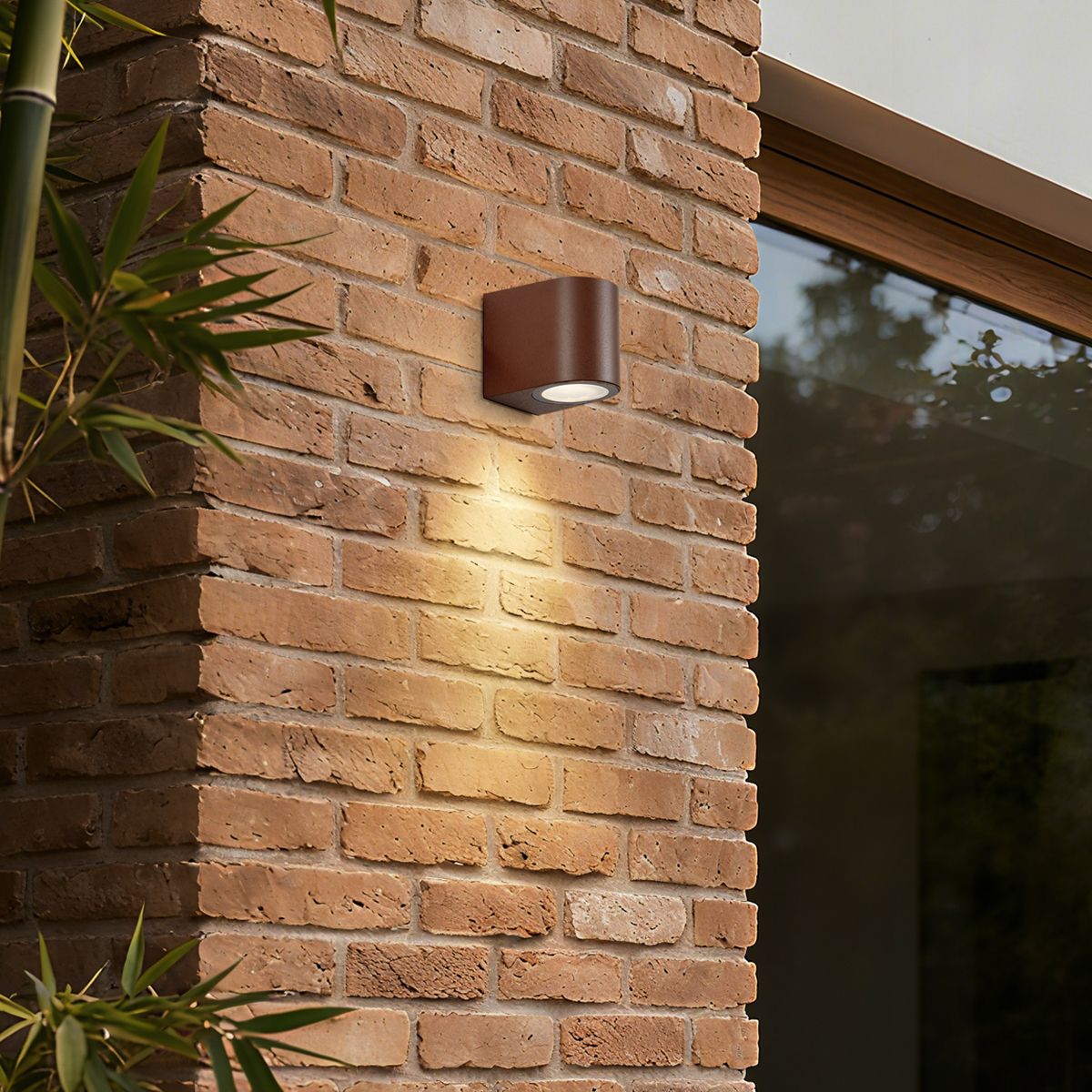 Moderne buiten wandlamp roestbruin kunststof ovaal - Baleno