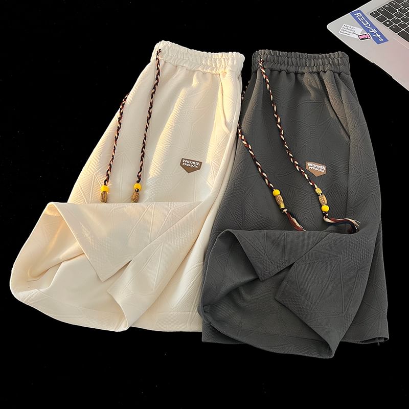 Derbundy - Trekkoord taille letters applicatie split sweat shorts