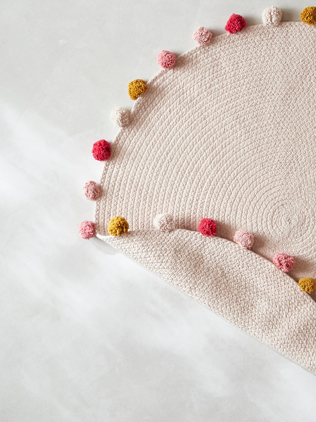 Tapis rond pompons en coton
