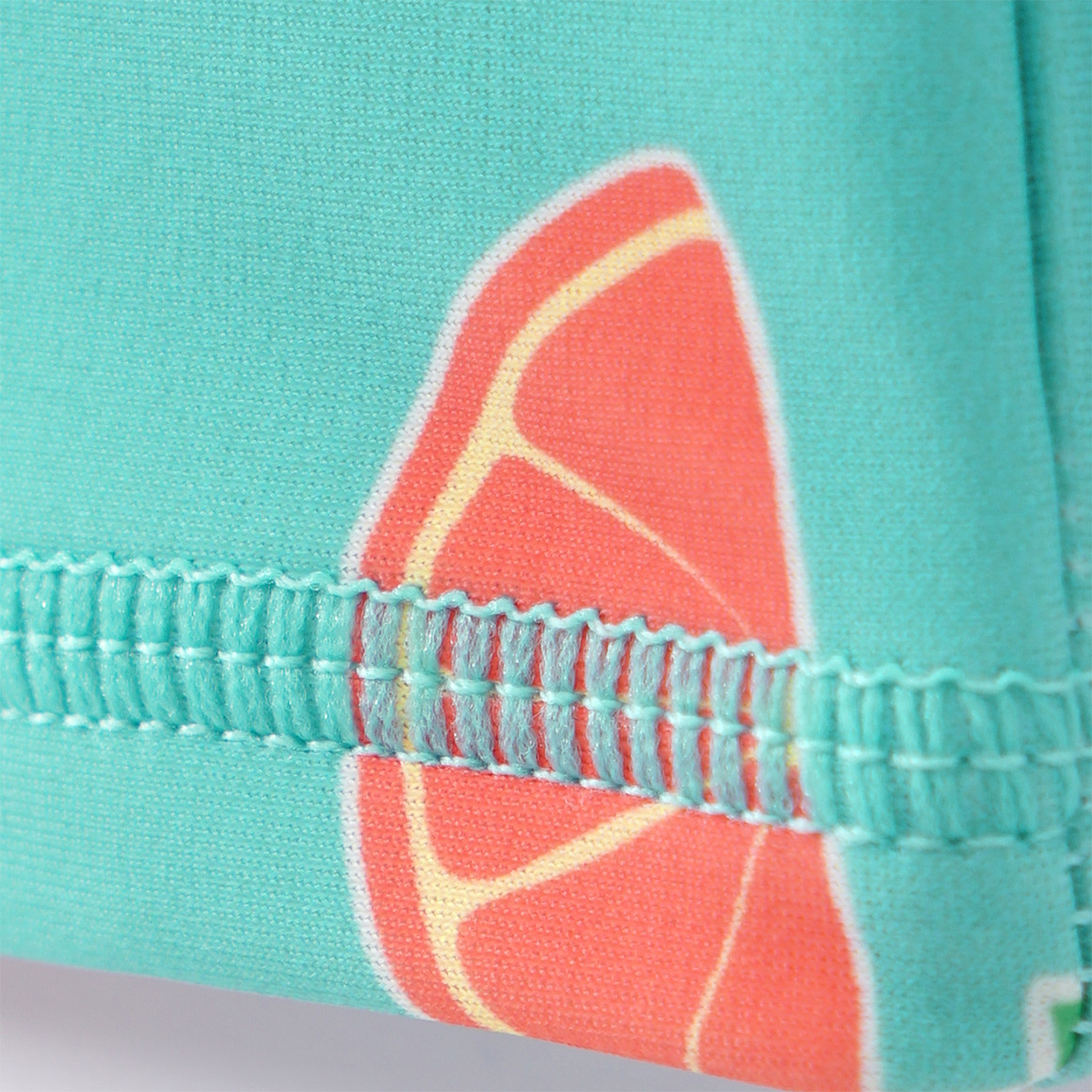 Famy Baby UV-Badeoverall und Badekappe im Set helltürkis