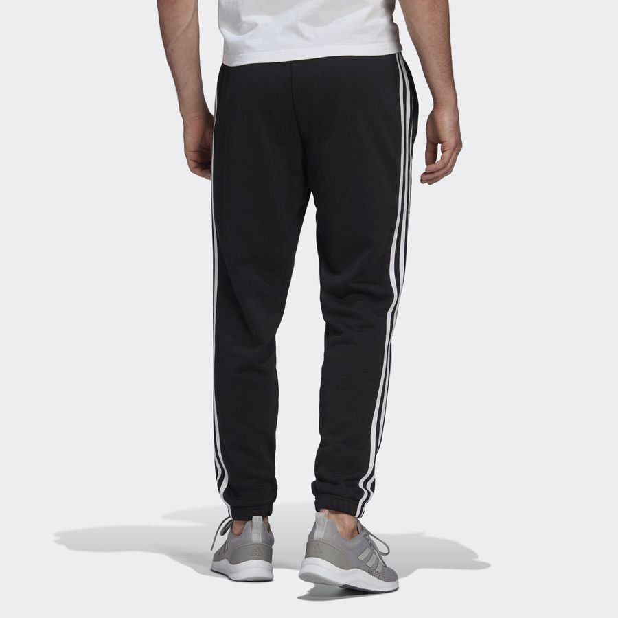 adidas Bas de Survêtement Essentials French Terry Tapered 3-Stripes - Noir/Blanc