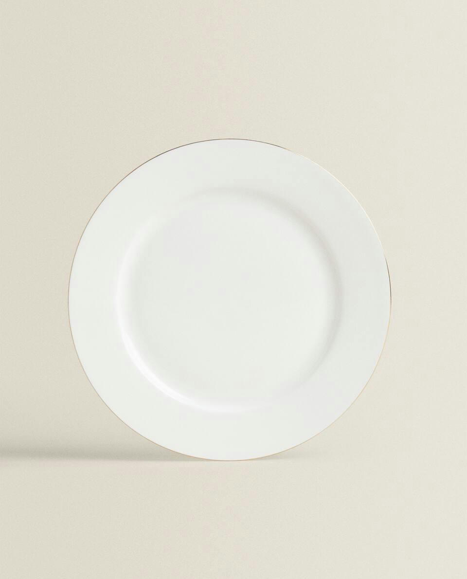 Louça de porcelana fina com borda dourada