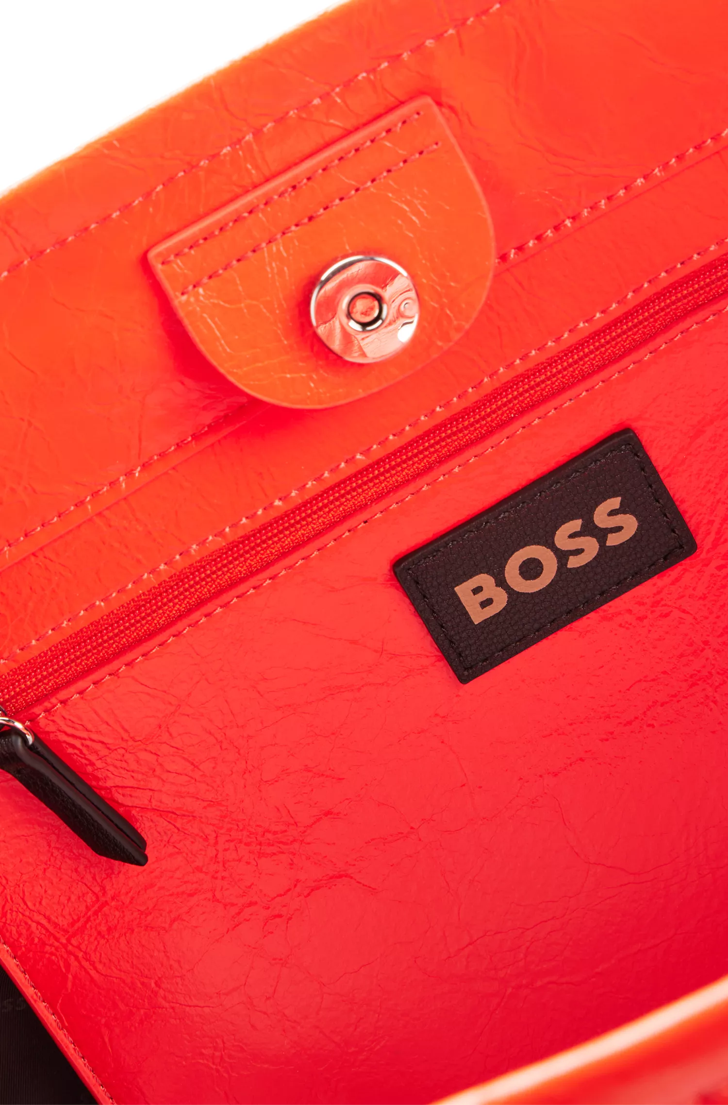 Bolsa BOSS Black-Shopper em couro sintético texturizado com minibolsa removível.