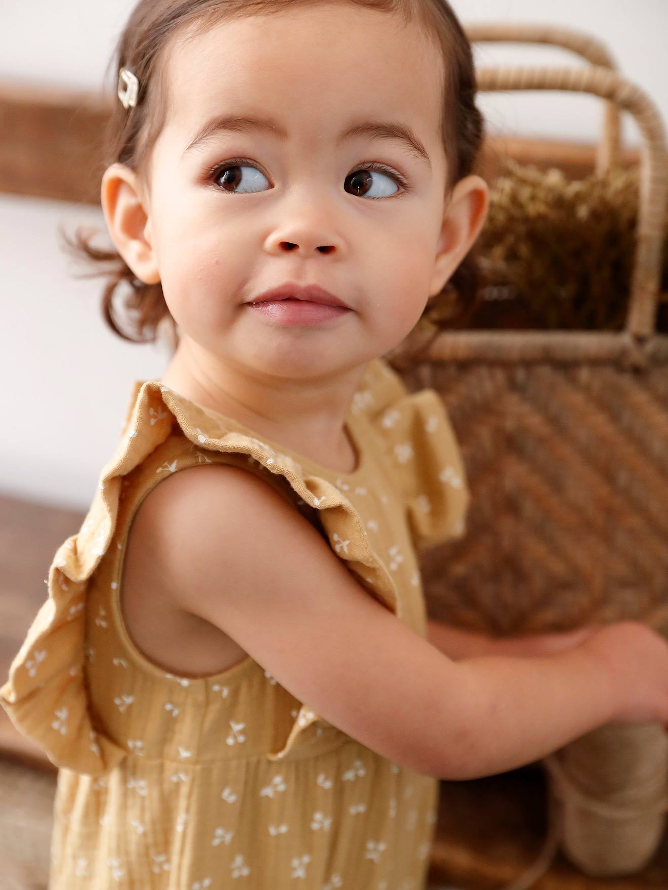 Macacão de bebê em chiffon de algodão amarelo claro
