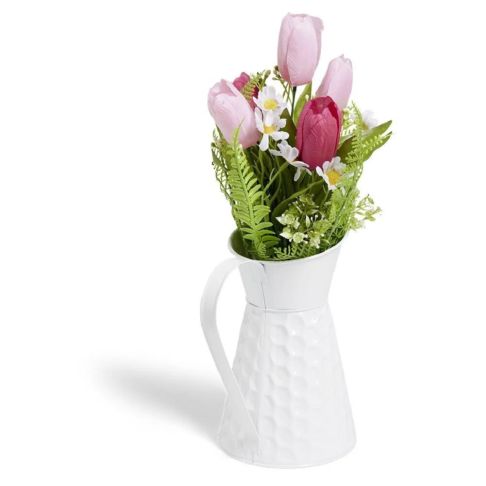 Fleus roses artificielles dans pot carafe blanc