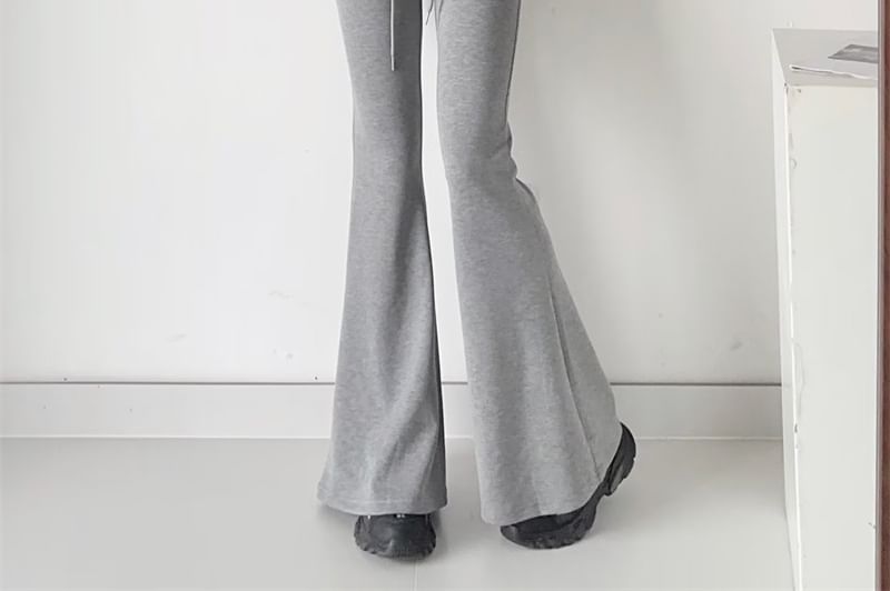 Bazer - Effen hoodie met rits / Hoge taille flared broek