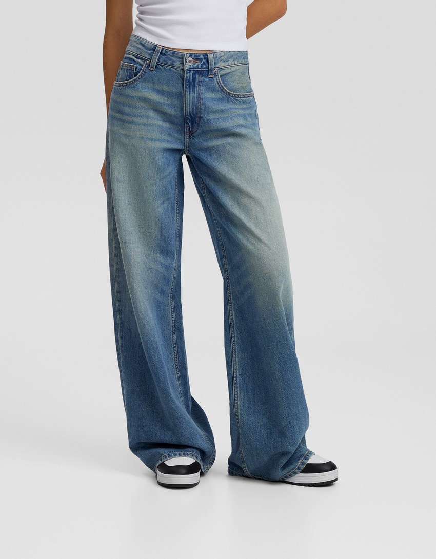 calça jeans de perna larga