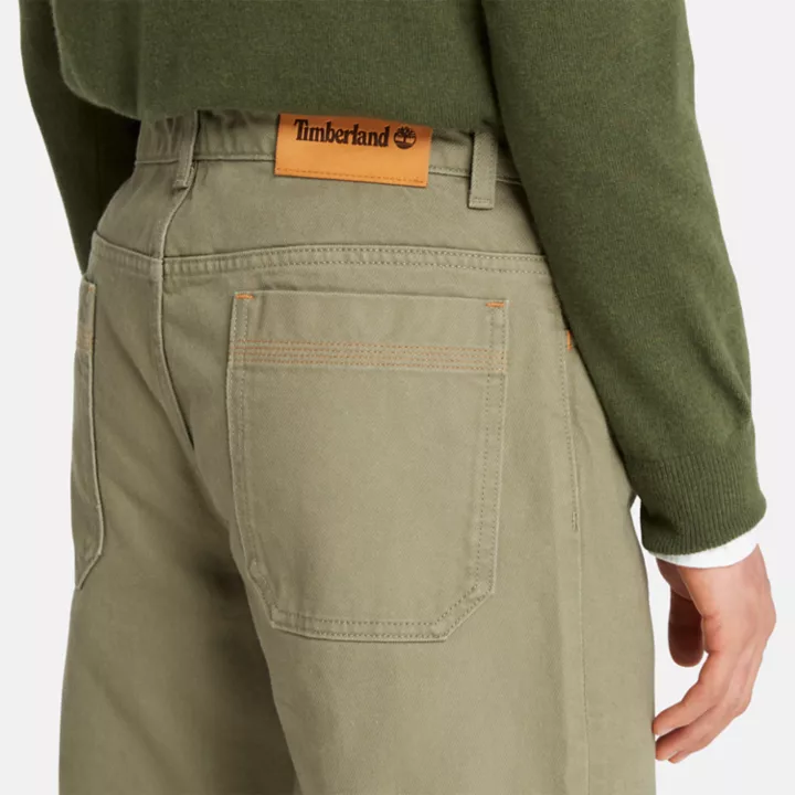 Calças retas Sandown de 5 bolsos para homem na cor verde.