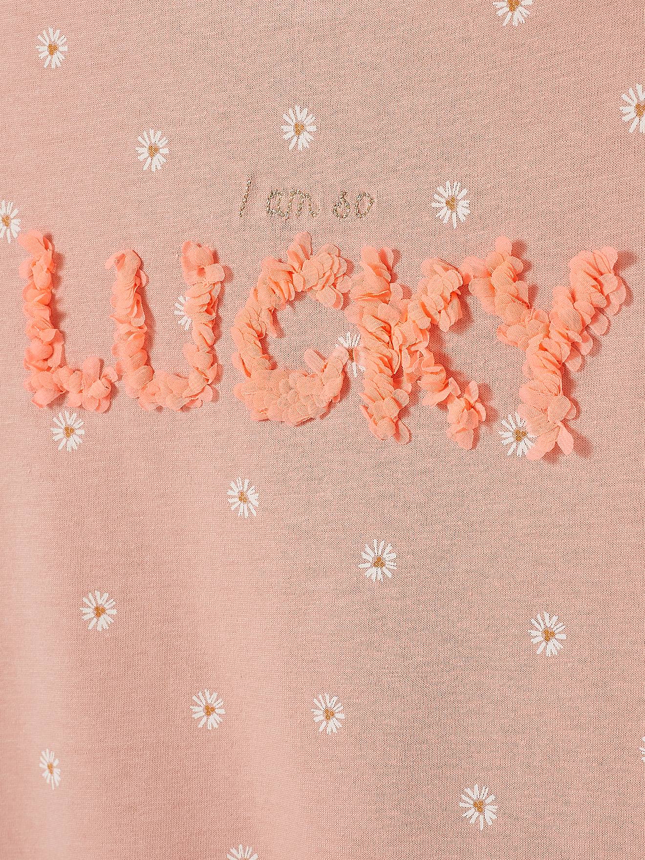 Camiseta infantil com estampa de flores em relevo, na cor off-white.