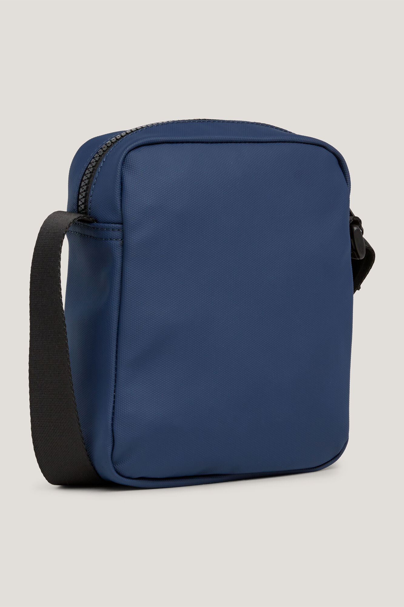 Bolsa de ombro masculina Tommy Jeans com bandeira.