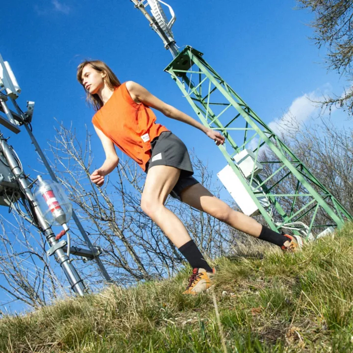Regata feminina Timberland x Icebreaker em lã merino laranja.