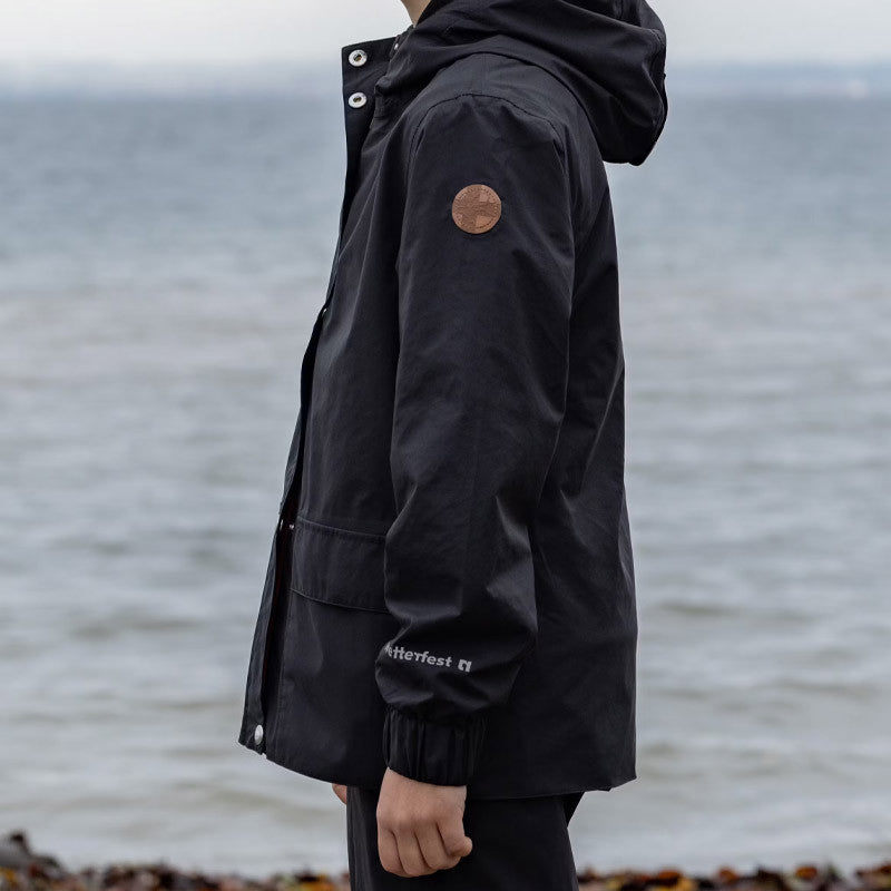 Kinder Suri Regenjacke black