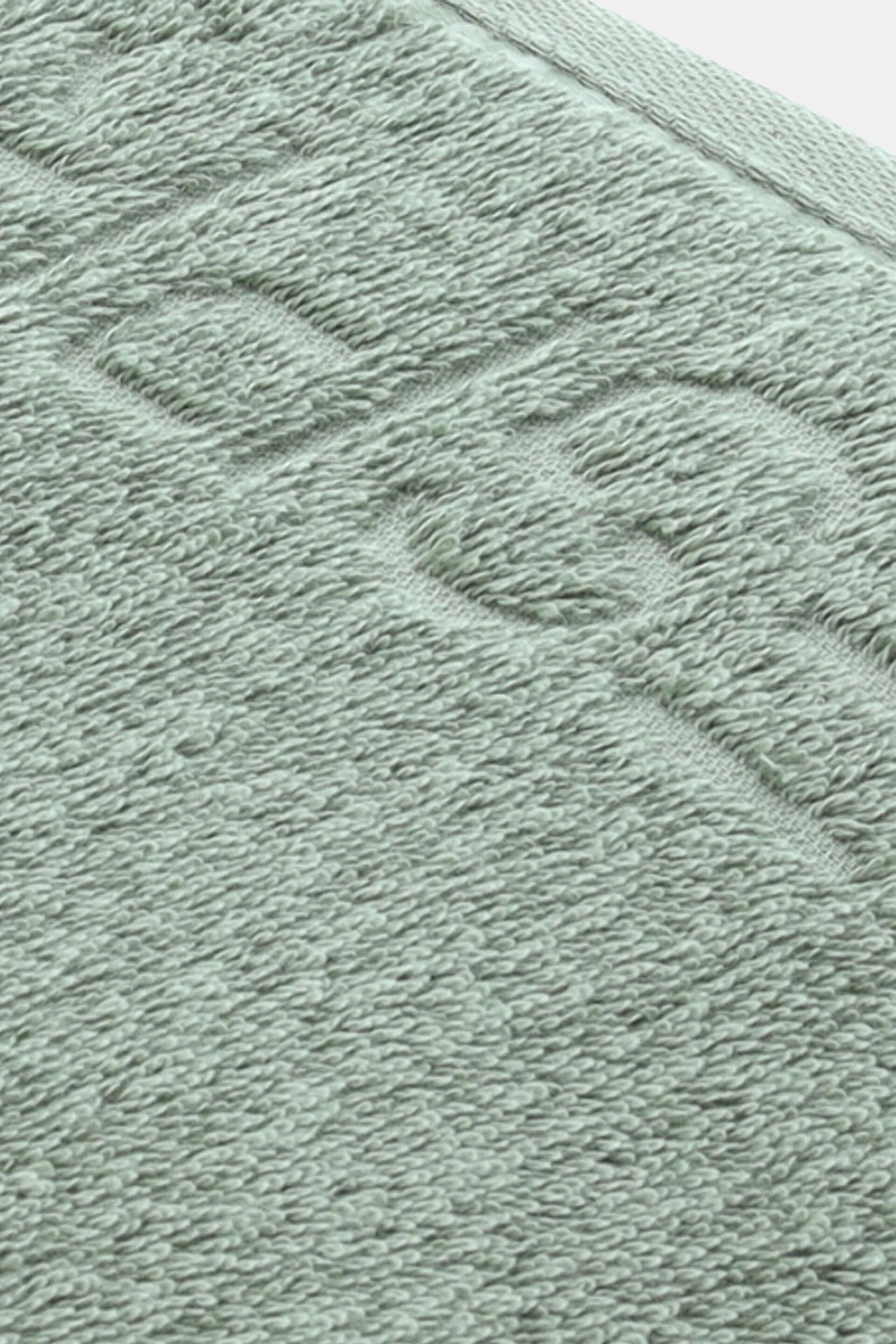Collection de draps de bain en tissu éponge