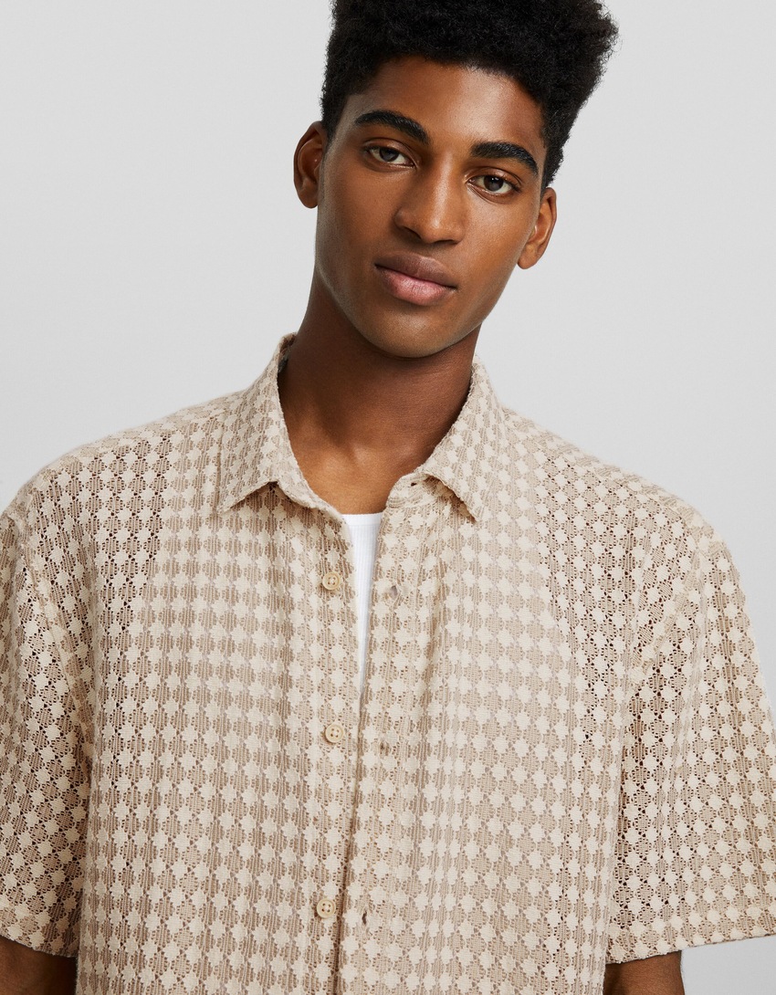 Camisa rústica de malha aberta de manga curta