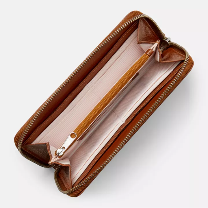 Casaco grande de couro com zíper para mulheres na cor marrom.