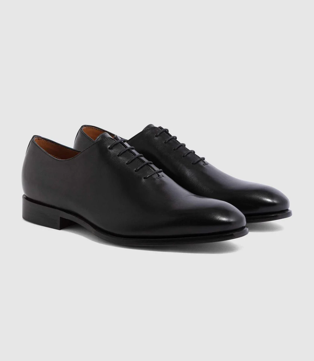 Chaussure coutures en cuir noir 
