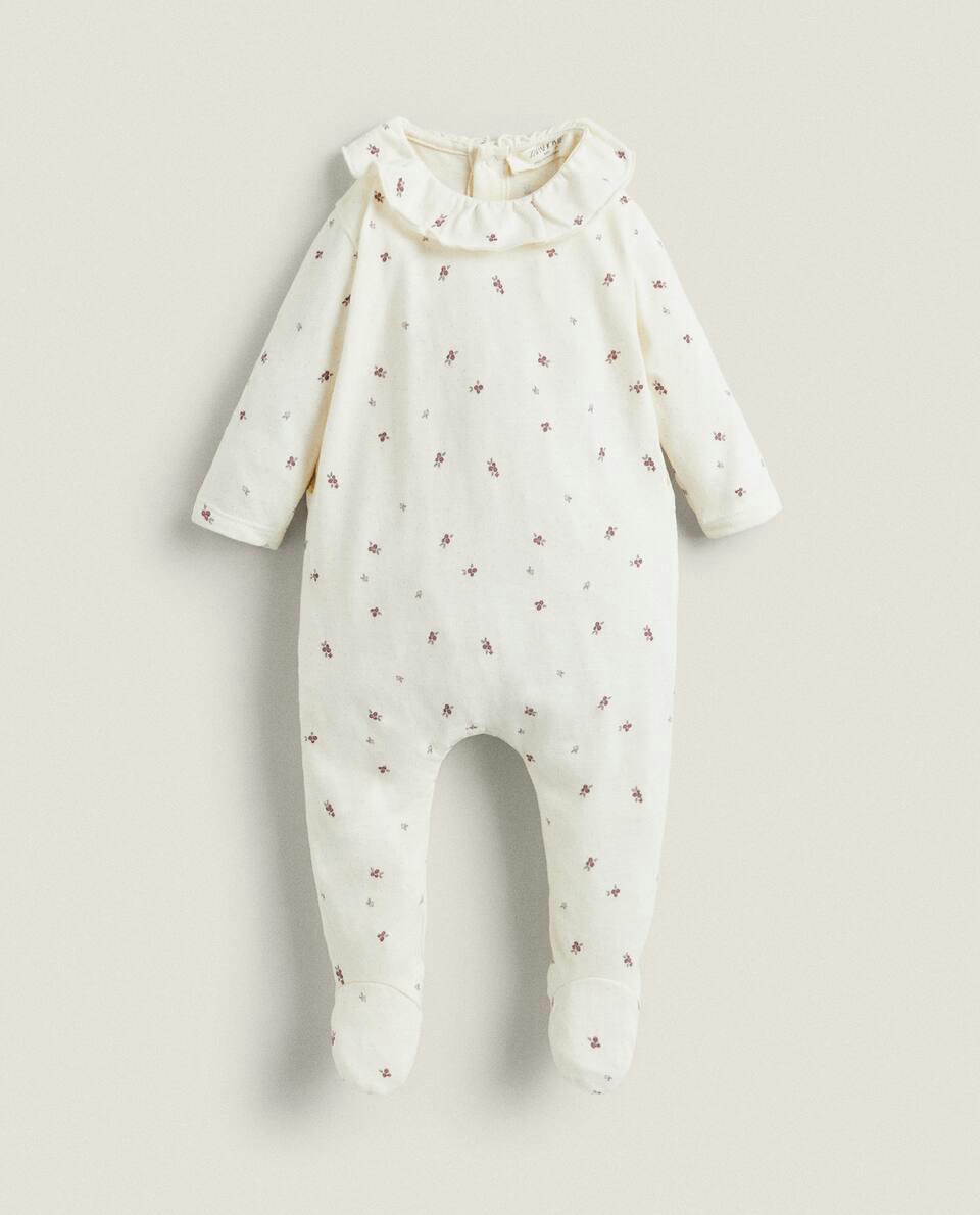 MACACÃO DE BEBÊ COM ESTAMPA FLORAL