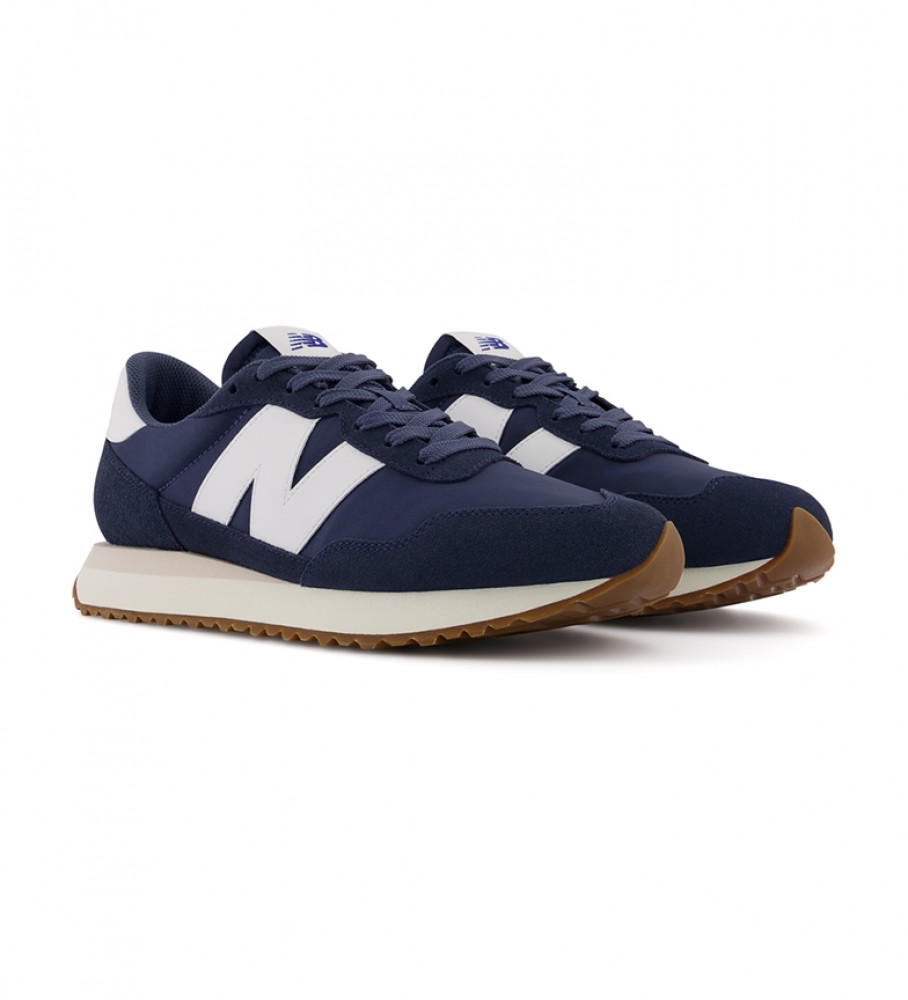 Tênis de couro New Balance MS237GB azul marinho