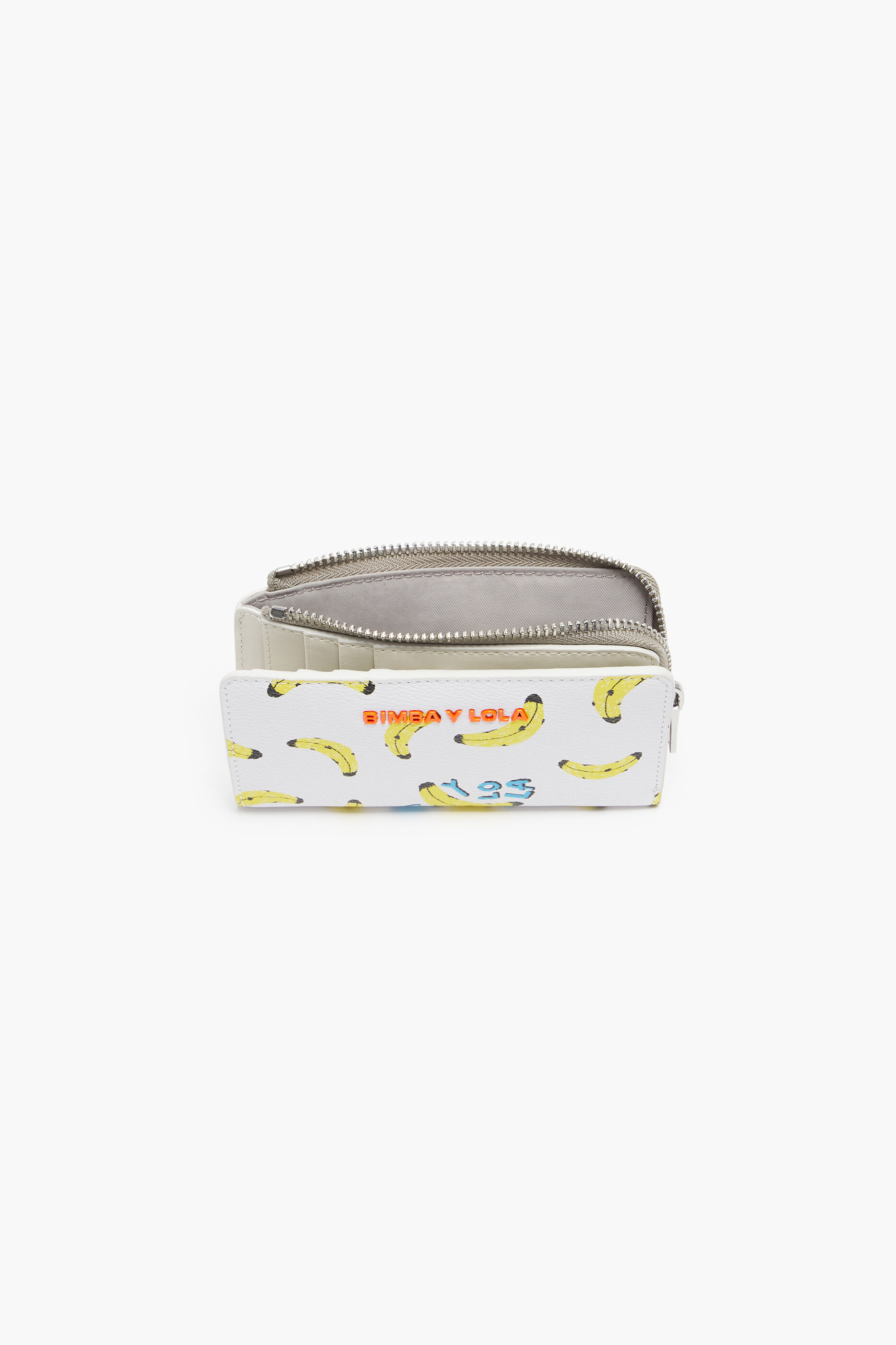 Bolsa retangular branca com textura de estampa de banana.