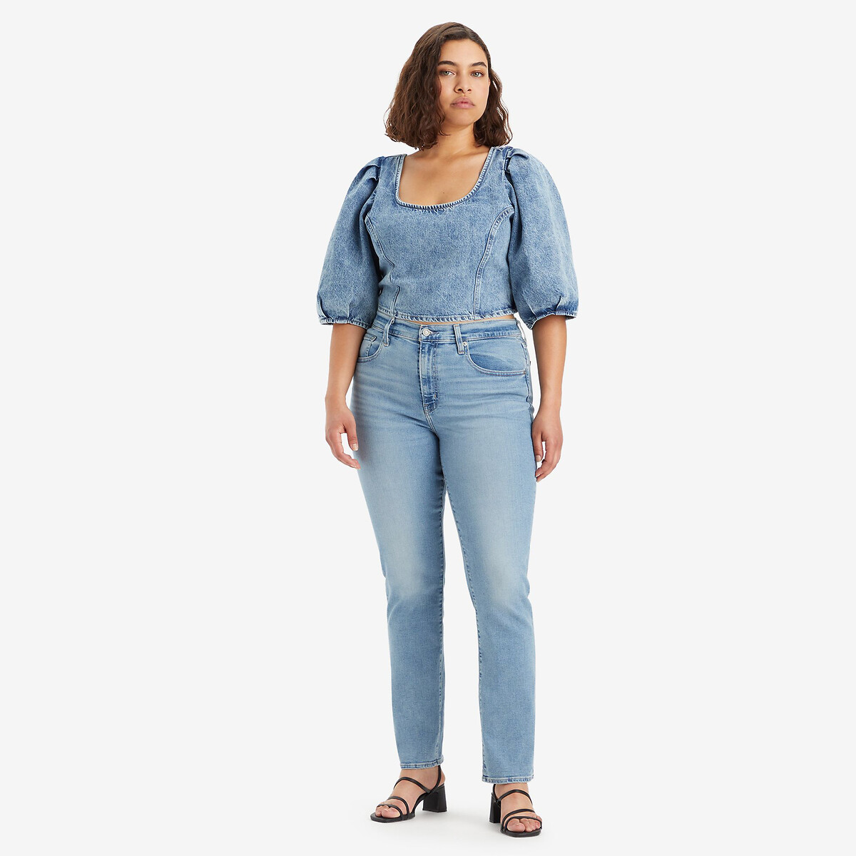 Calça jeans Levi's 724 de cintura alta e corte reto.