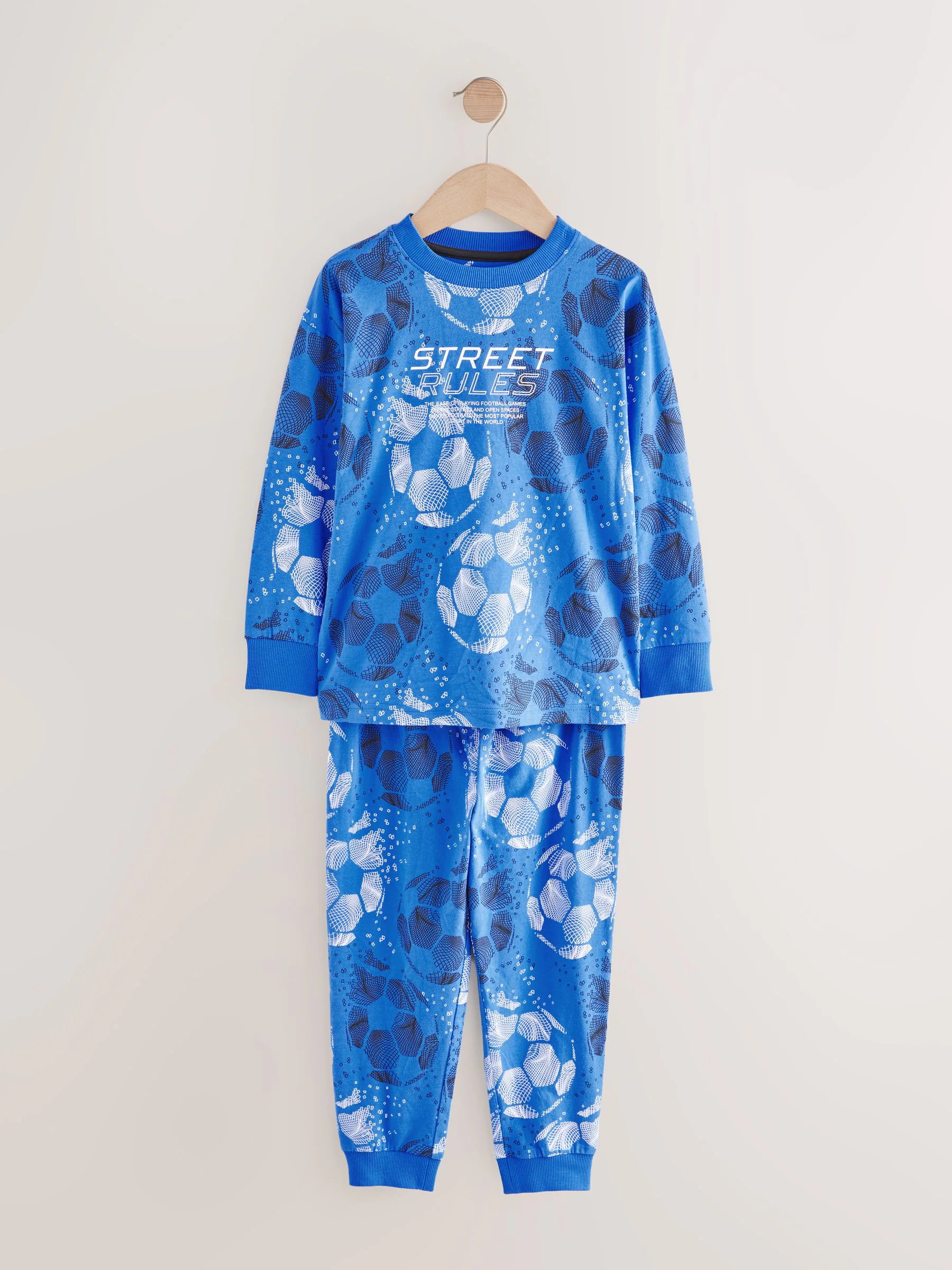 Blauw/zwart met voetbal - Verpakking van 2 pyjama's met lange mouwen (3-16 jr)