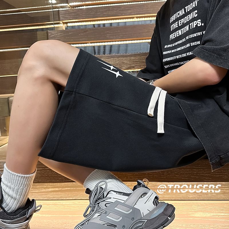 Kimeya - Zweetshorts met trekkoord en sterrenprint