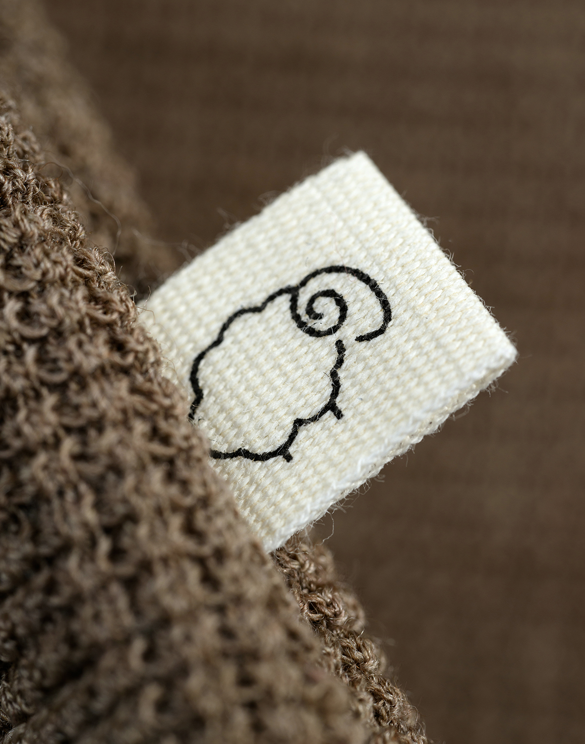 Overslagtrui met wafelpatroon in merinowol voor baby’s