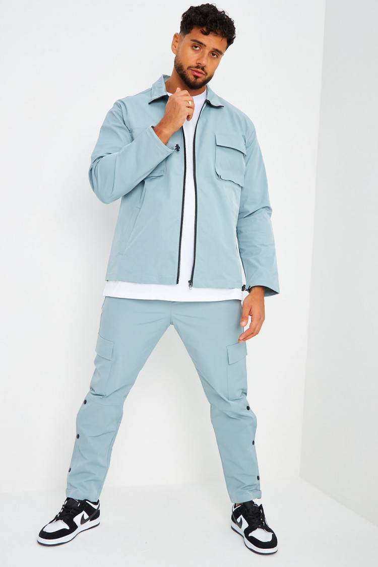 Ensemble de jogging veste + pantalon bleu grisé à boutons