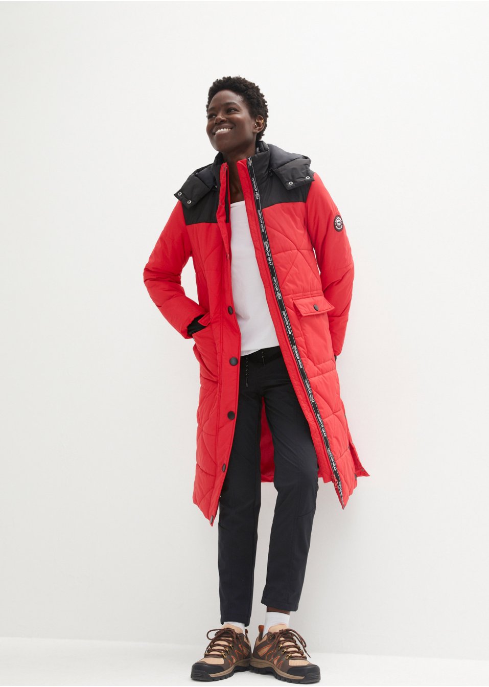Manteau outdoor imperméable avec boutons sur le côté