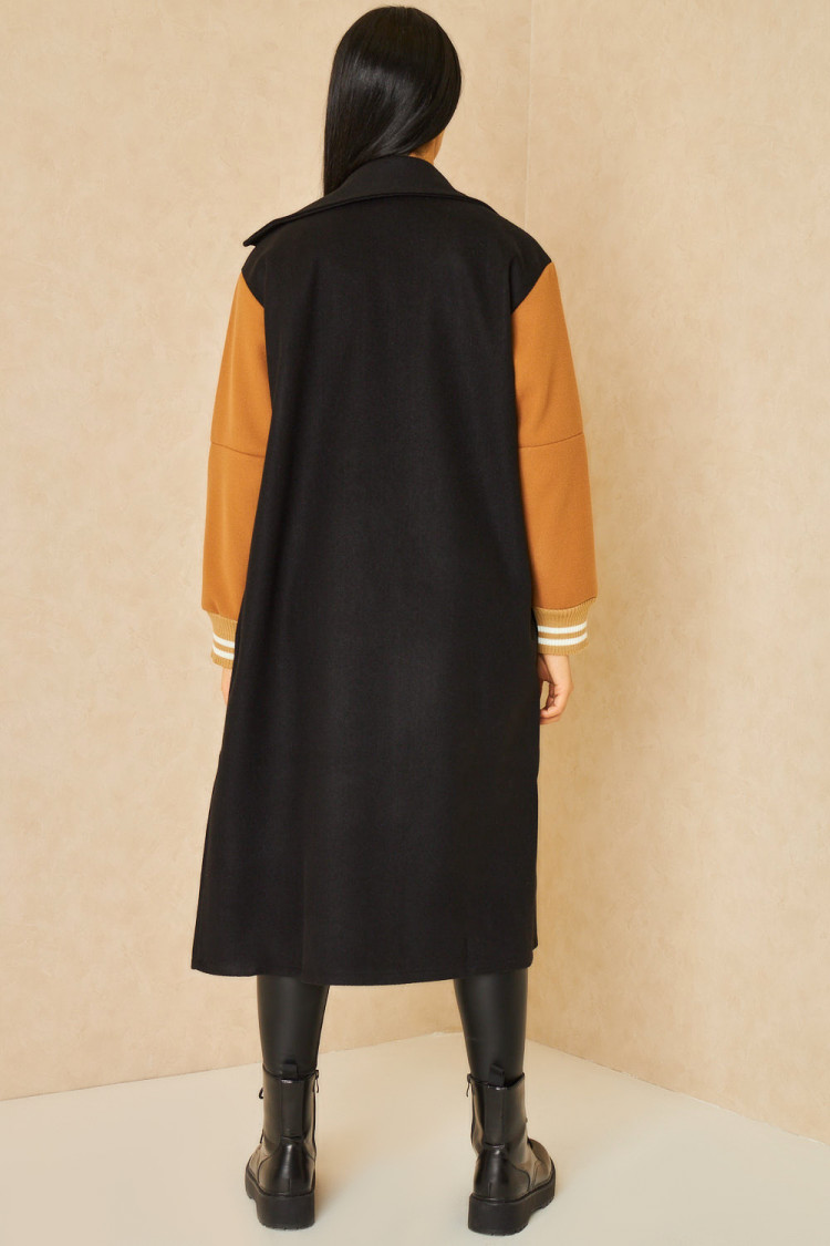 Manteau noir manches camel