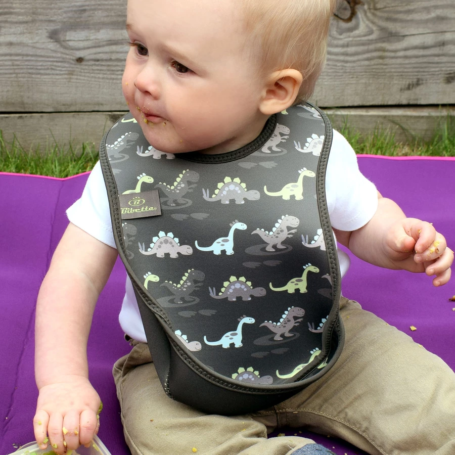 Bibetta Neopren-Lätzchen UltraBib® Dinosaurier warmes grau, 2 Stück