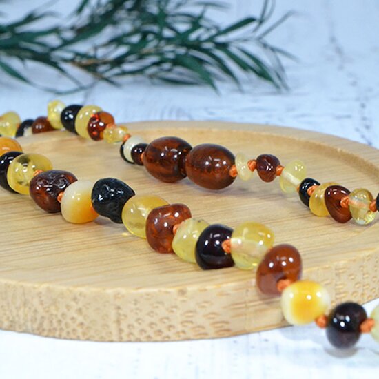 Collier Ambre bébé   Multi        de               Irréversible