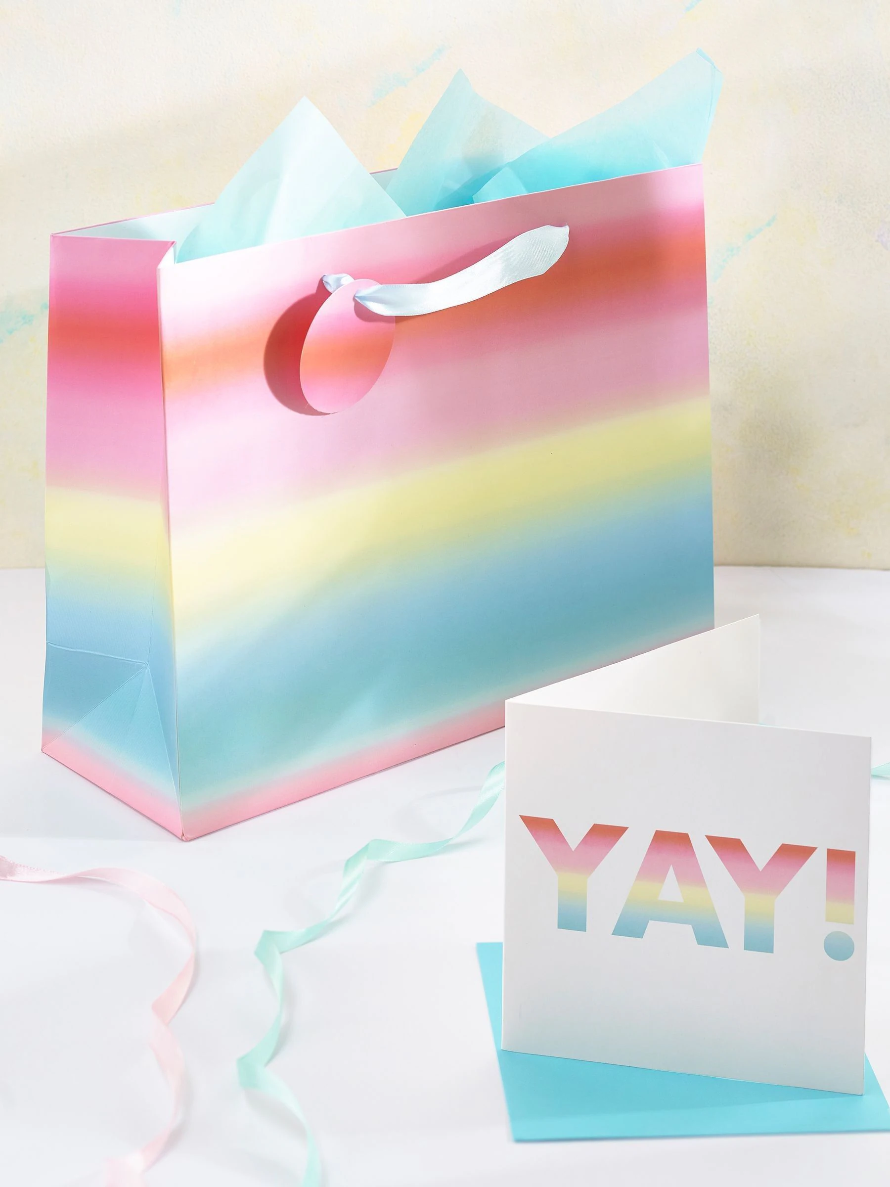 Kaart en geschenktas met kleurverloop
