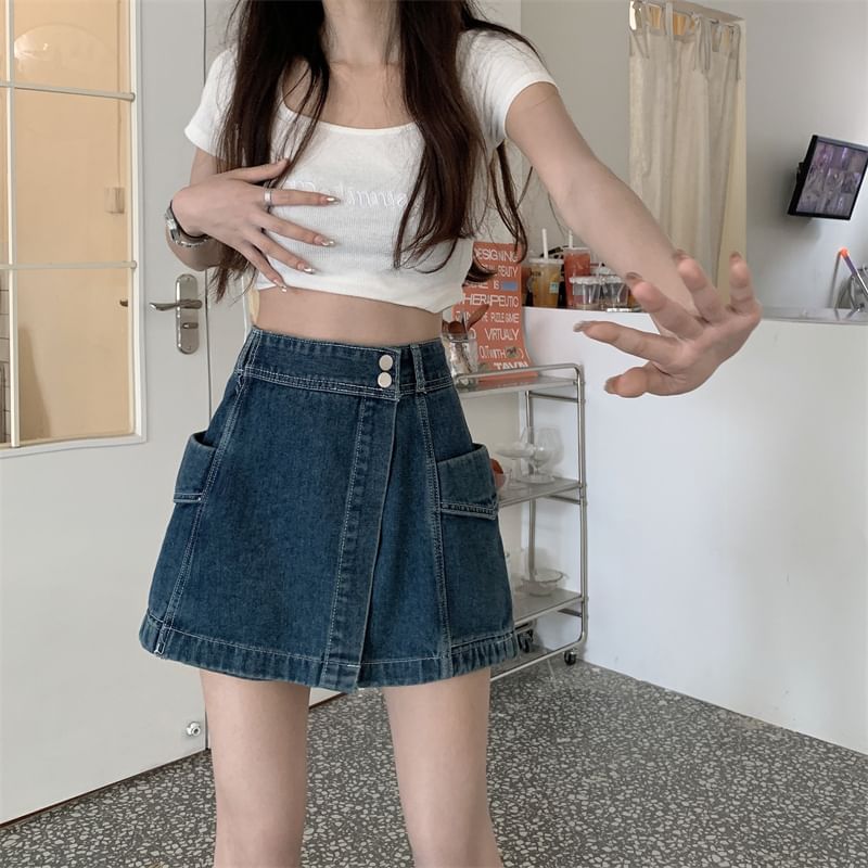 Moon City - Asymmetrische, gewassen denim skort met hoge taille