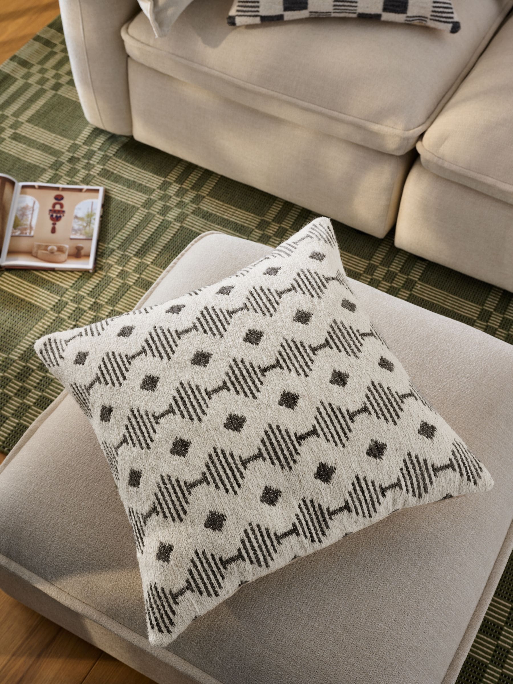 Geweven kussen met geometrische print