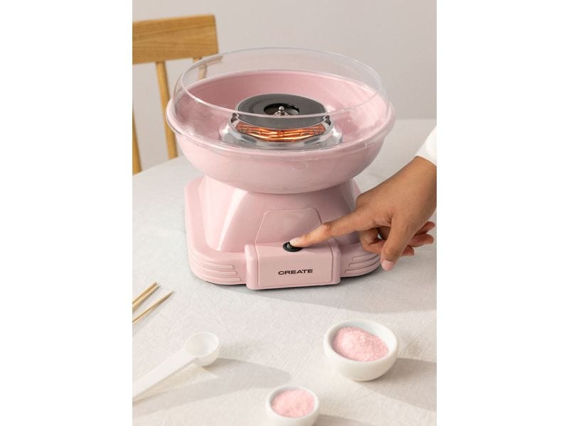 Create Zuckerwattemaschine Pastelrosa Zuckerwattemaschine im Retro-Design