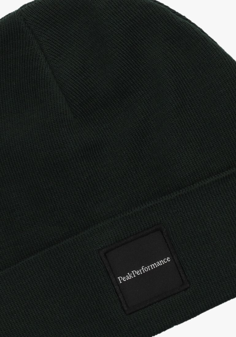 donkergroene peak performance muts switch hat