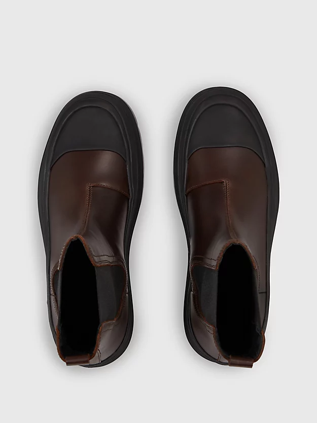botas de couro até o tornozelo