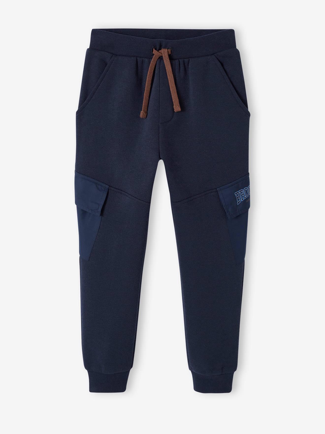 Calça de fato de treino infantil azul-escuro com bolsos de aba.