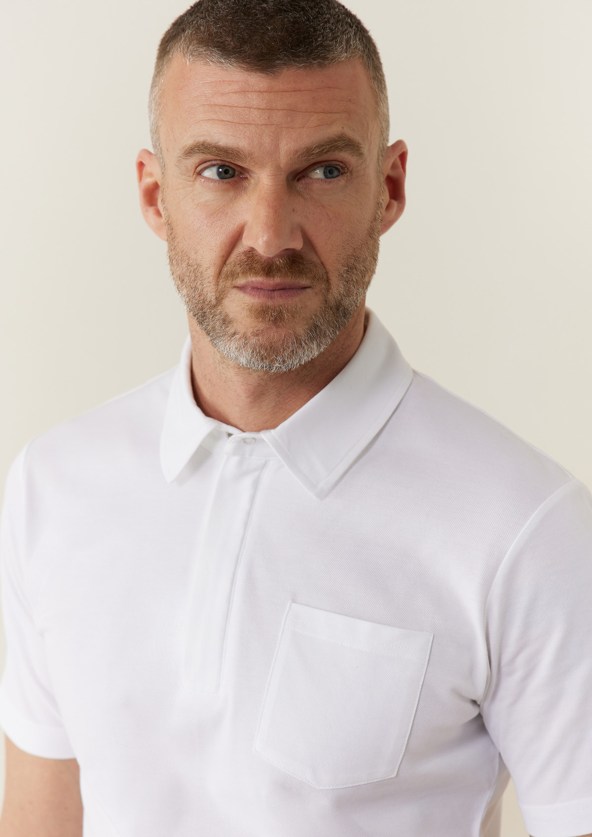Polo Prodigieux en coton mélangé uni blanc