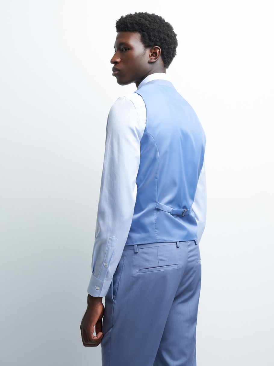 Gilet coordonnable en laine uni