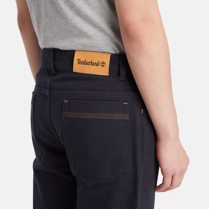 Calças retas Sandown de 5 bolsos para homem, na cor azul marinho.