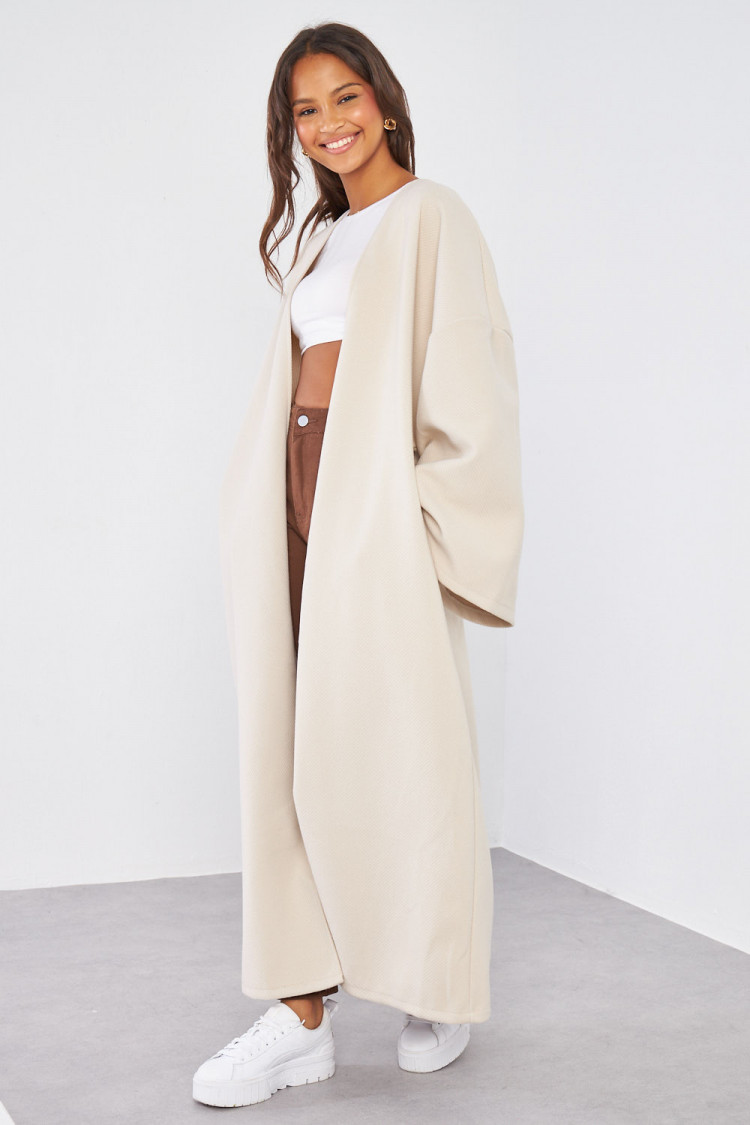 Manteau beige à manches amples