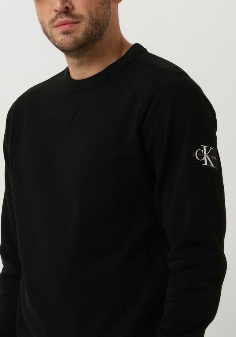 CALVIN KLEIN zwarte calvin klein sweater monogram sleeve badge cn
