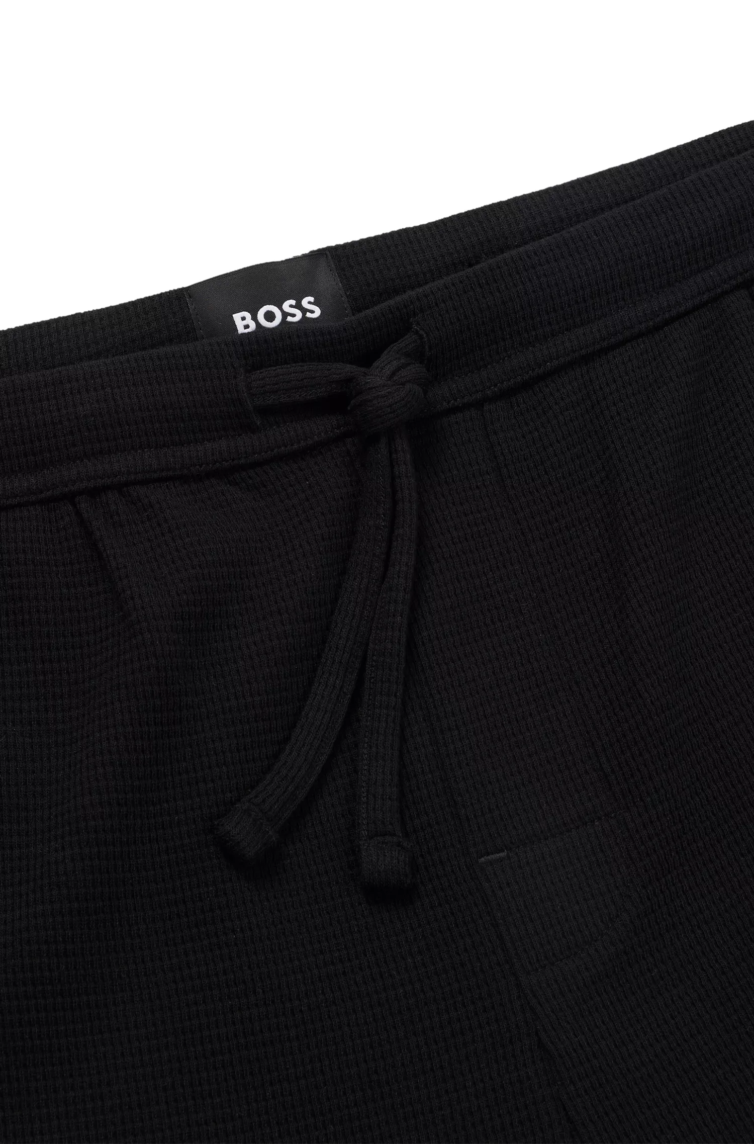 Calções de pijama BOSS em mistura de algodão preto com logotipo bordado.