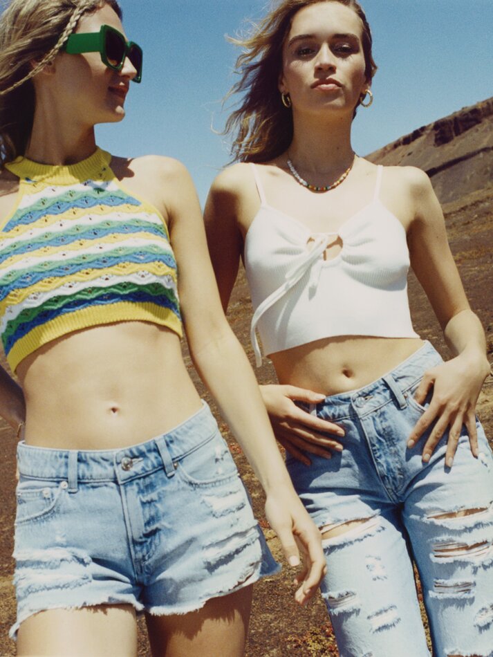 Shorts jeans com rasgos - Azul claro