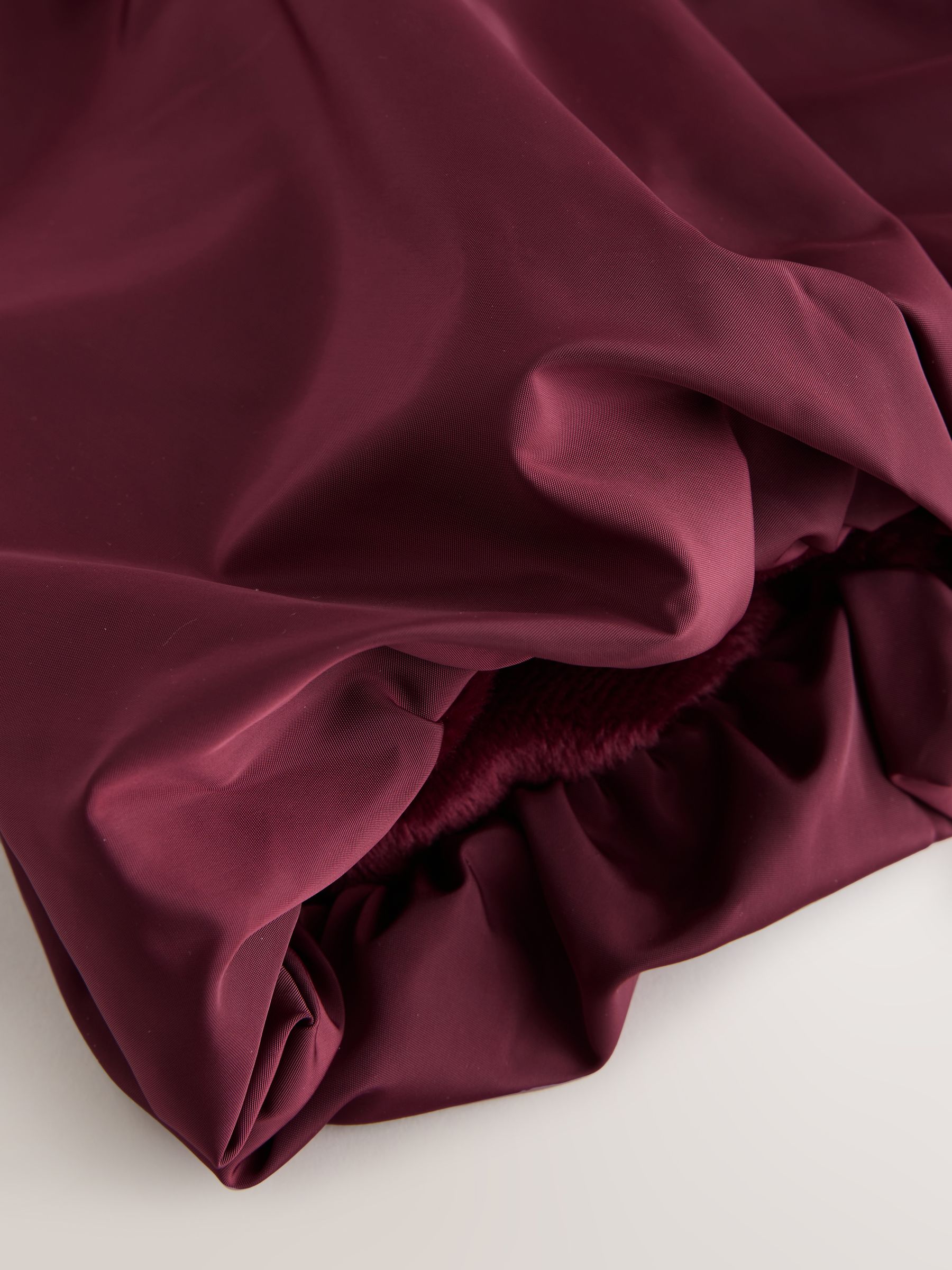 Bordeauxrood - Regenbestendige jas met rok en strikdetail (3mnd -7jr)