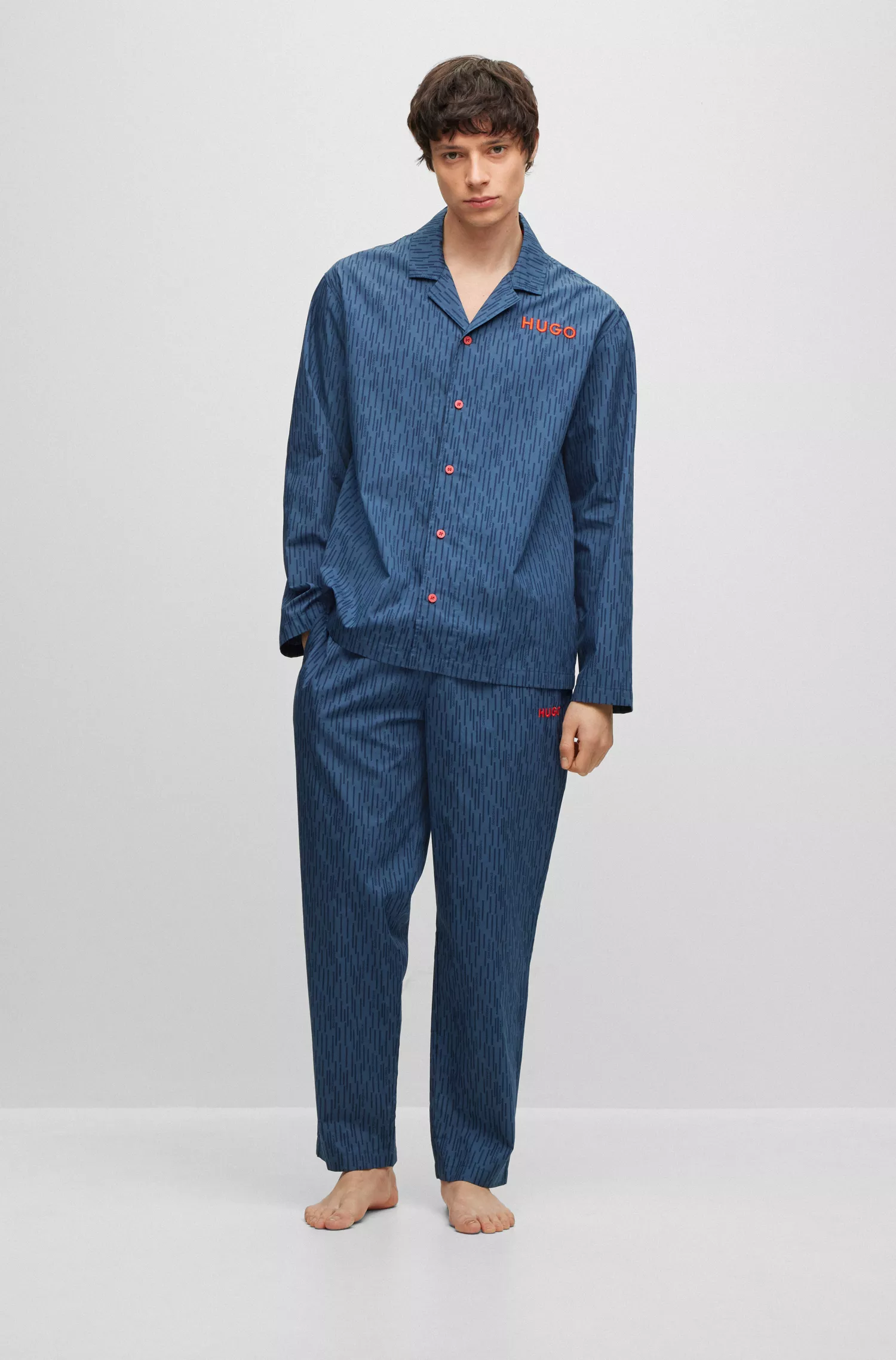 Pijama HUGO vermelho em popeline de algodão com estampa do logotipo inspirada na chuva.